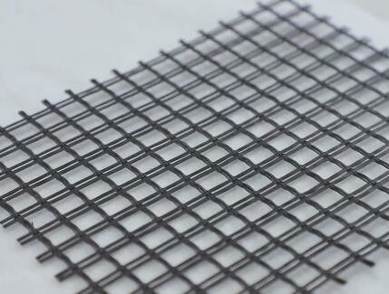 ผ้าปรับเสถียรภาพดิน Geogrid โพลีเอสเตอร์ PET เคลือบ PVC มีความแข็งแรงสูง