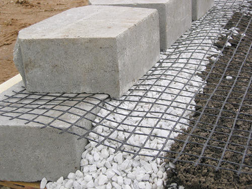 ผ้าปรับเสถียรภาพดิน Geogrid โพลีเอสเตอร์ PET เคลือบ PVC มีความแข็งแรงสูง